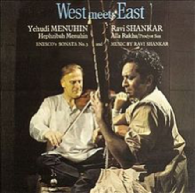 Color image of Menuhin and Shakar seated crossed-legged intently playing their instruments, violin and sitar respectively, against a black background. The text reads “West meets East” and then in two blocks of three lines above each musician, “Yehudi Menuhin/Hephzibah Menuhin/Enenco’s Sonata No. 3 and Ravi Shankar/ Alla Rakha/Prodyot Sen/Music by Ravi Shankar.”